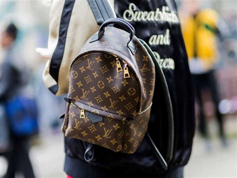 louis vuitton christopher backpack real vs fake|is louis vuitton a scam.